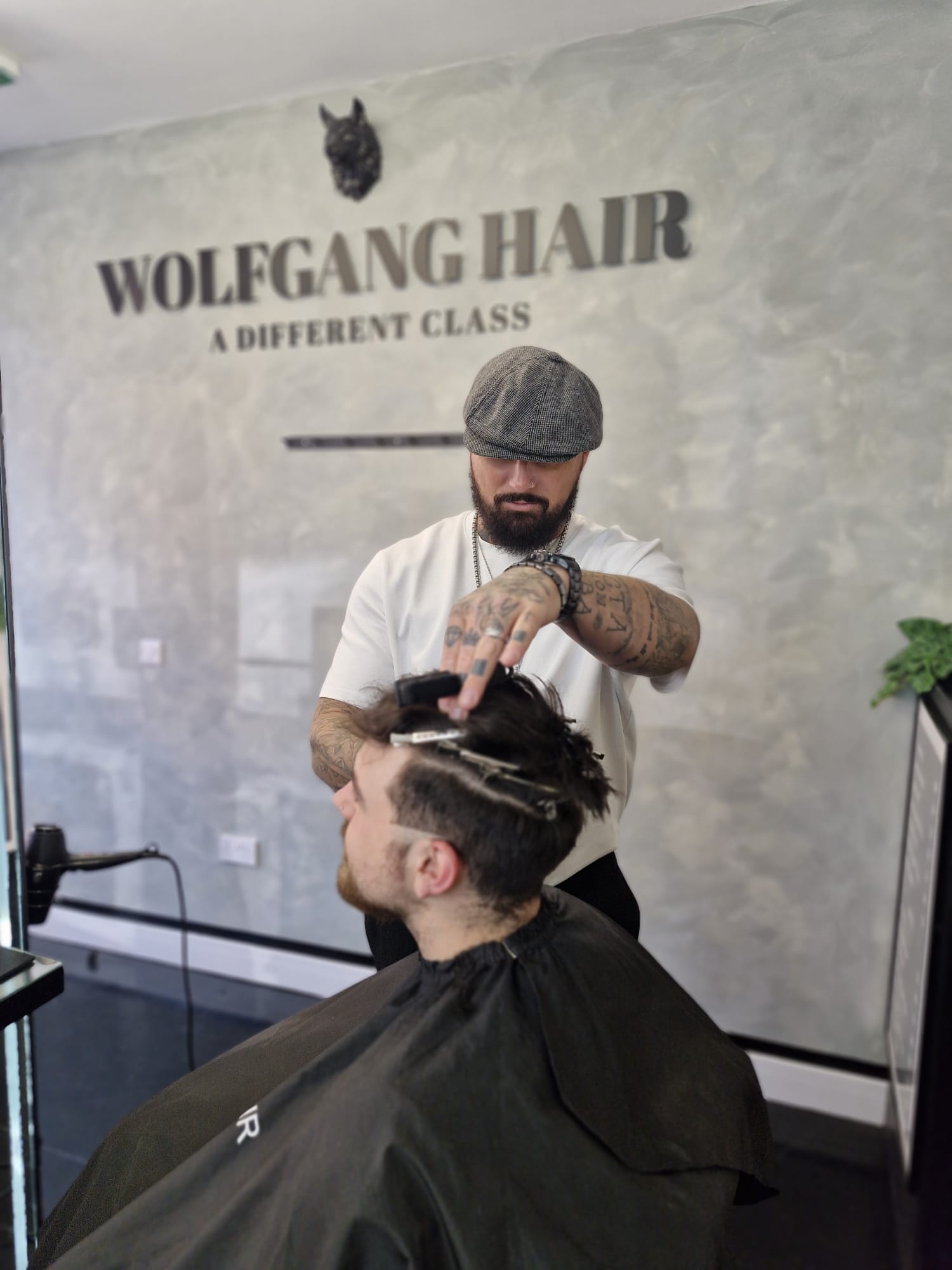 Wolfgang Hair master barber at the Leicester shop