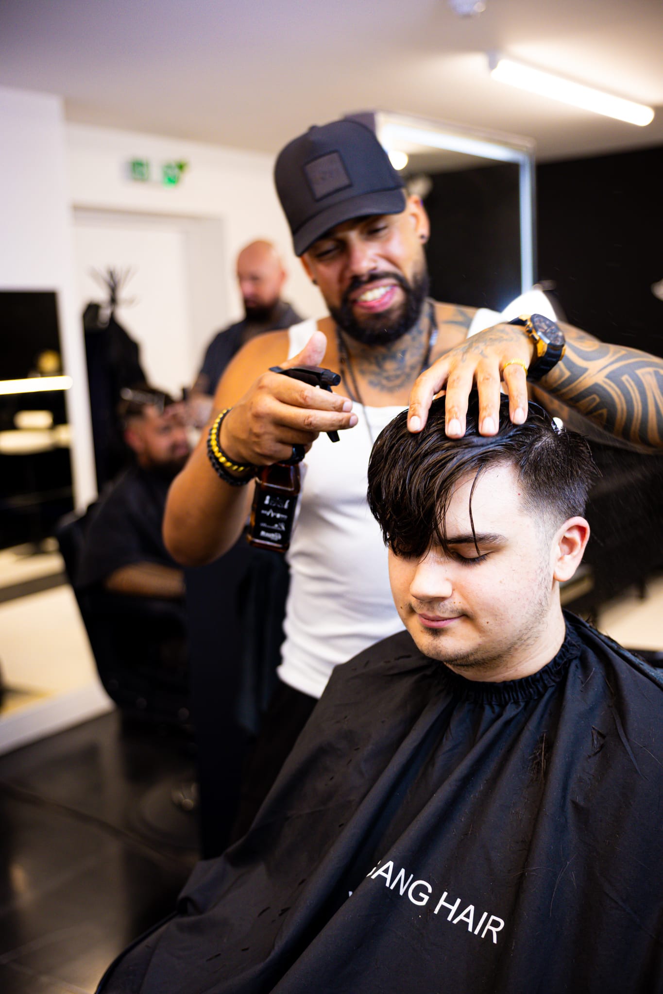 Sharp skin fade with styling at Wolfgang Hair