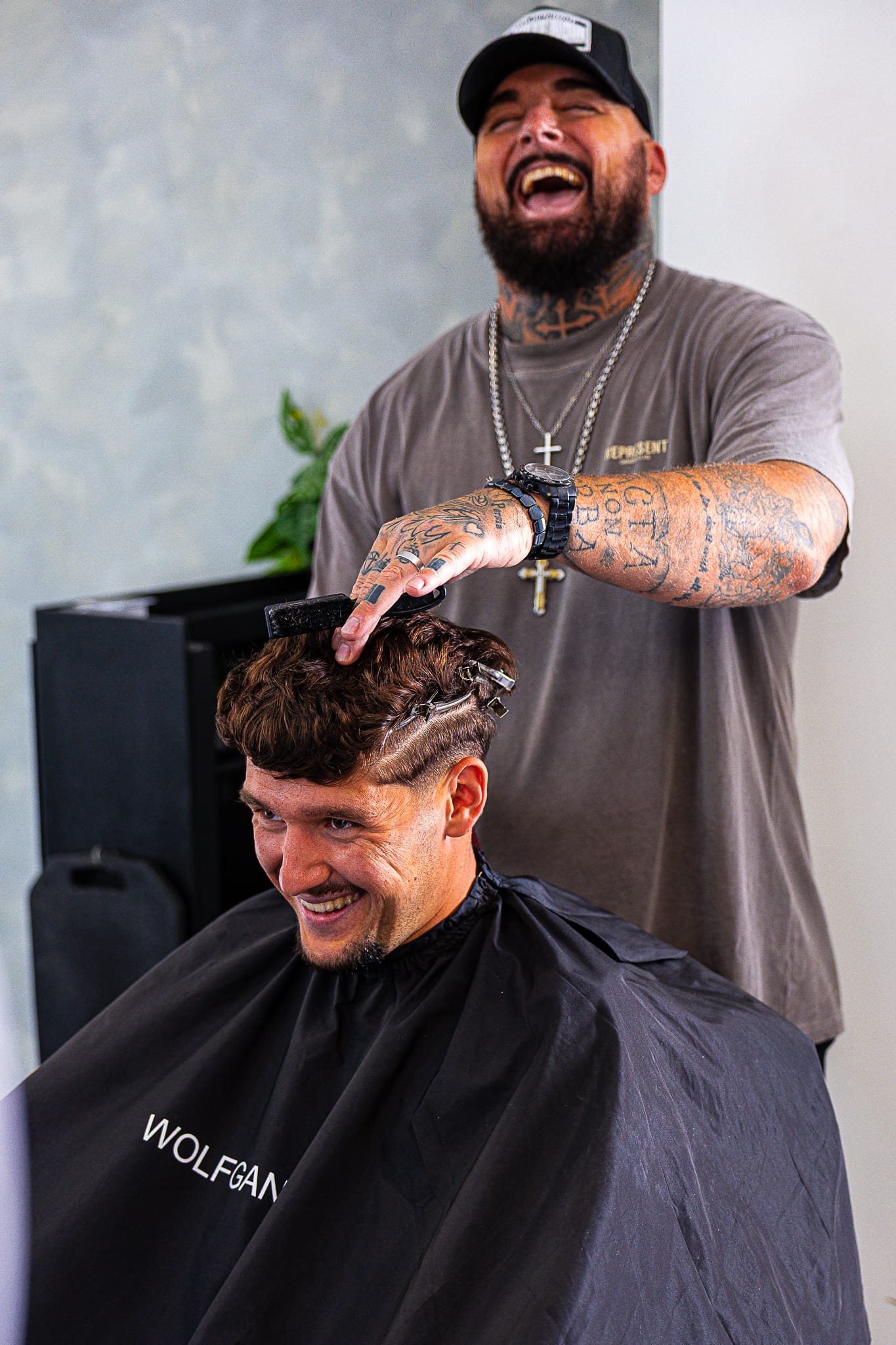 Scissor cut in progress at Wolfgang Hair