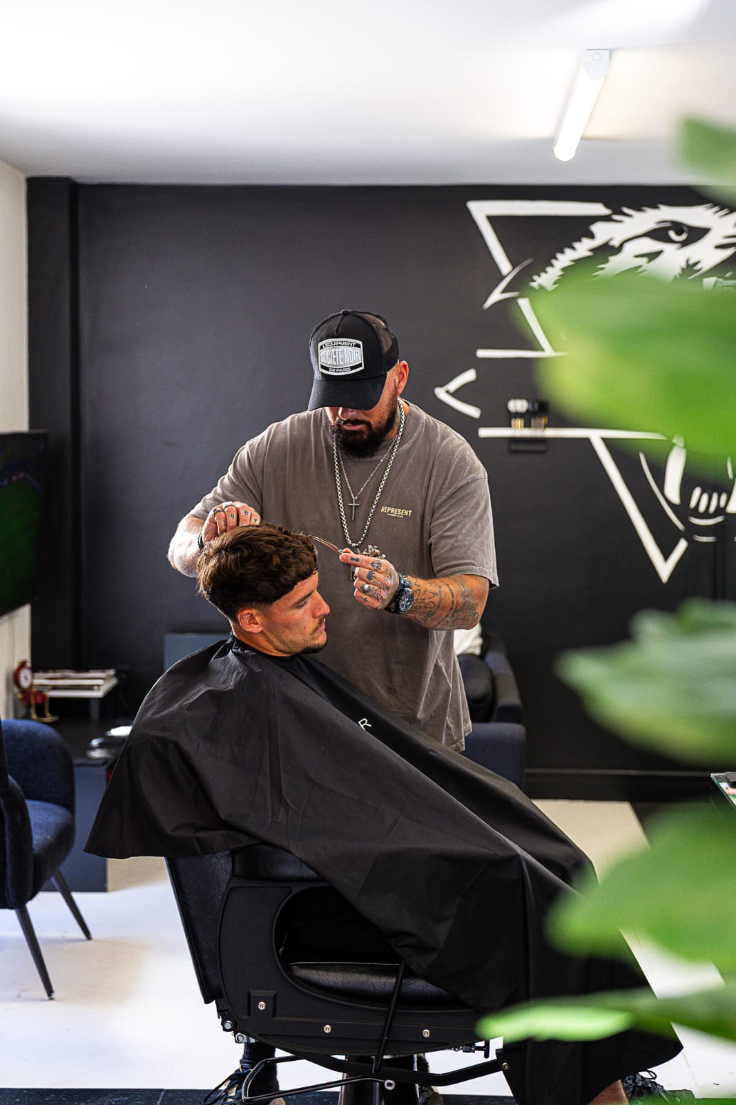 Barber detailing a fade at Wolfgang Hair Leicester